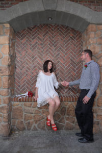 Photographers of Las Vegas - Wedding Photography - couple in brick arch