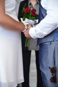 Photographers of Las Vegas - Wedding photography - holding hands and wedding flowers