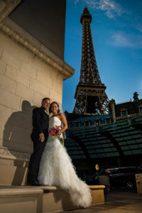 Photographers of Las Vegas - Wedding Photography - wedding couple at Eiffel tower at Paris hotel vegas