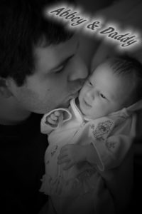 Photographers of Las Vegas - Portrait Photography - new dad with newborn