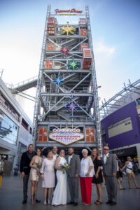 Photographers of Las Vegas - Wedding Photography - Group wedding photo on Fremont Experience