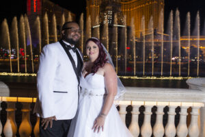 Photographers of Las Vegas - Wedding Photography - Wedding Couple in front of Bellagio Fountains