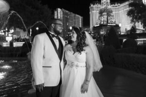 Photographers of Las Vegas - Wedding Photography - B+W image Bride and Groom posed photo on the Vegas Strip