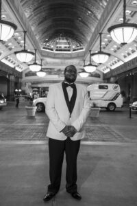 Photographers of Las Vegas - Wedding Photography - B+W image Groom posed photo on the Vegas Strip