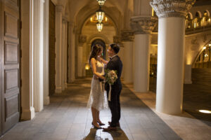 Photographers of Las Vegas - Wedding Photography - Bride and Groom back lit posed photos on the Vegas Strip