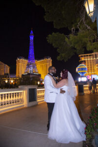 Photographers of Las Vegas - Wedding Photography - wedding photo in front of Eiffel Tower Paris Hotel Las Vegas