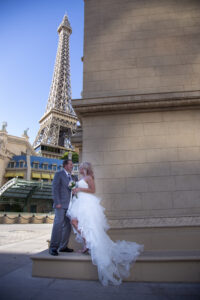 Photographers of Las Vegas - Wedding Photography - wedding photo in front of Eiffel Tower Paris Hotel Las Vegas