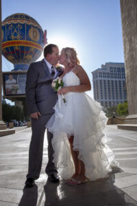 Photographers of Las Vegas - Wedding Photography - Bride and Groom in front of Paris Balloon