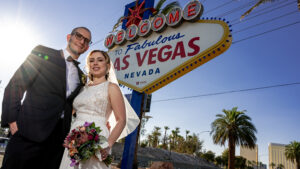 Photographers of Las Vegas - Wedding Photography - couple at vegas sign