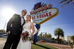 Photographers of Las Vegas - Wedding Photography - couple at las vegas sign