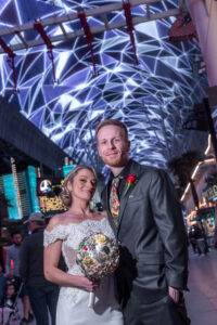 Photographers of Las Vegas - Elopement Photography - couple photo on dtlv fremont st 2