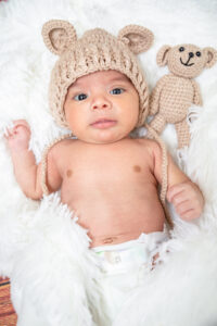 Photographers of Las Vegas – Studio Photography – Newborn Baby White fuzzy blanket teddy bear