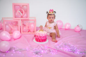 Photographers of Las Vegas – Studio Photography – Baby Birthday Portrait Pink Floor White Backdrop Cake Smash