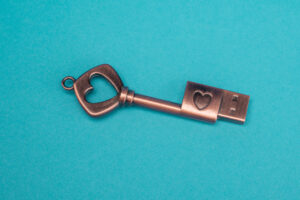 Photographers of Las Vegas – Studio Product Photography – Copper Heart Key USB Teal Blue Backdrop