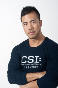 Photographers Of Las Vegas - Headshot Photography - Male Model CSI Las Vegas black blue long sleeve shirt white background