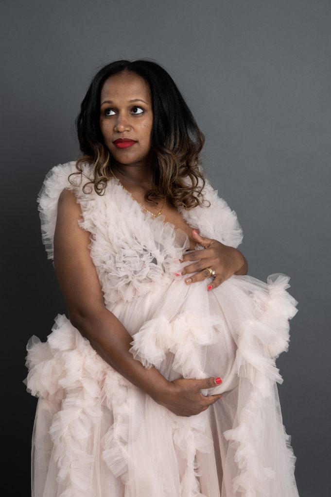 Photographers of Las Vegas - Maternity Photos- Woman In Flowing Holding Belly