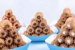 Photographers Of Las Vegas - Commercial Photography - Churros filled inside cherry chocolate vanilla sugar cinnamon blue cardboard plates