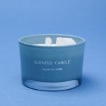 Photographers Of Las Vegas - Commercial Photography -White Candle crystal stones in wax blue background scented candle relax at home
