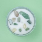 Photographers Of Las Vegas - Commercial Photography -White Candle crystal stones in wax mint green background
