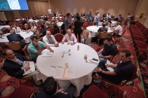 Photographers Of Las Vegas - Event Photography - Men women blazer button up convention meeting large conference room