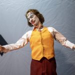 Photographers Of Las Vegas - Commercial Photography - Joker clown sculpture figure realistic yellow vest