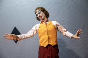 Photographers Of Las Vegas - Commercial Photography - Joker clown sculpture figure realistic yellow vest