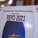 Photographers Of Las Vegas - Event Photography - Repo 2021 sign convention white blue red