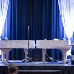 Photographers Of Las Vegas - Event Photography - Man woman playing piano singing preforming blue drapery