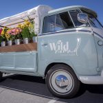 Photographers Of Las Vegas - Commercial Photography - Wild nomad flower truck Volks wagon light blue truck white wall tires