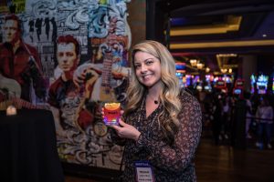Photographers Of Las Vegas - Event Photography - Convention business shipt woman posing cocktail drink orange