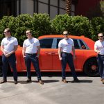 Photographers Of Las Vegas - Commercial Photography - Male model posing with orange Rolls Royce multiple exposure composition