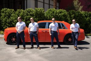Photographers Of Las Vegas - Commercial Photography - Male model posing with orange Rolls Royce multiple exposure composition