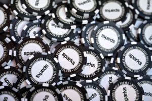 Photographers Of Las Vegas - Commercial Photography - Poker chips black and white pile Sparks memorable experiences build brands