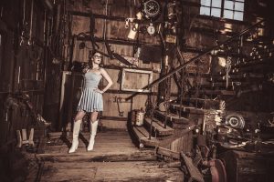 Photographers of Las Vegas - graduation photoshoot - old rustic desert building at nelsons ghost town