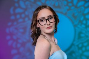 Photographers of Las Vegas - graduation photoshoot -senior photoshoot - studio photoshoot with gobo and purple and teal lights