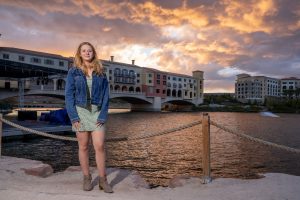 Photographers of Las Vegas - Senior photography - sunset photo with senior lake las vegas nevada water and bridge