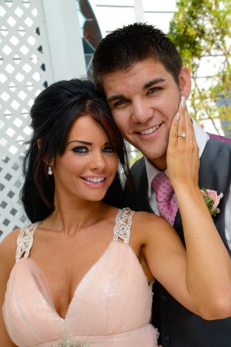 Photographers of Las Vegas - Wedding Photography - wedding bride and groom inside gazebo happy