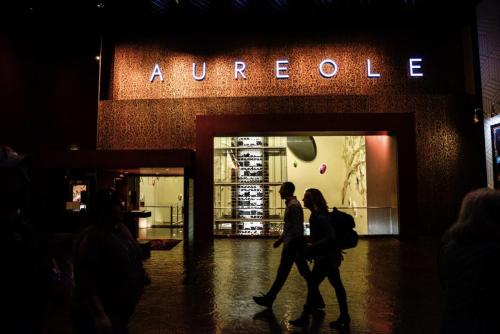 Photographers Of Las Vegas - Commercial Photography - Storefront Aureole pattern walking silhouette man woman