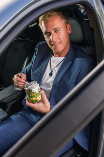 Photographers of Las Vegas - Product Photography - male in car eating from measuring jar